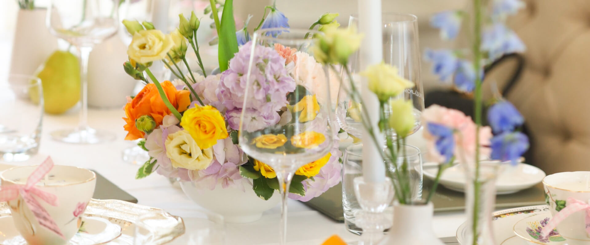 melrose flower lab table with a variety of colorful flowers arranged in a vase