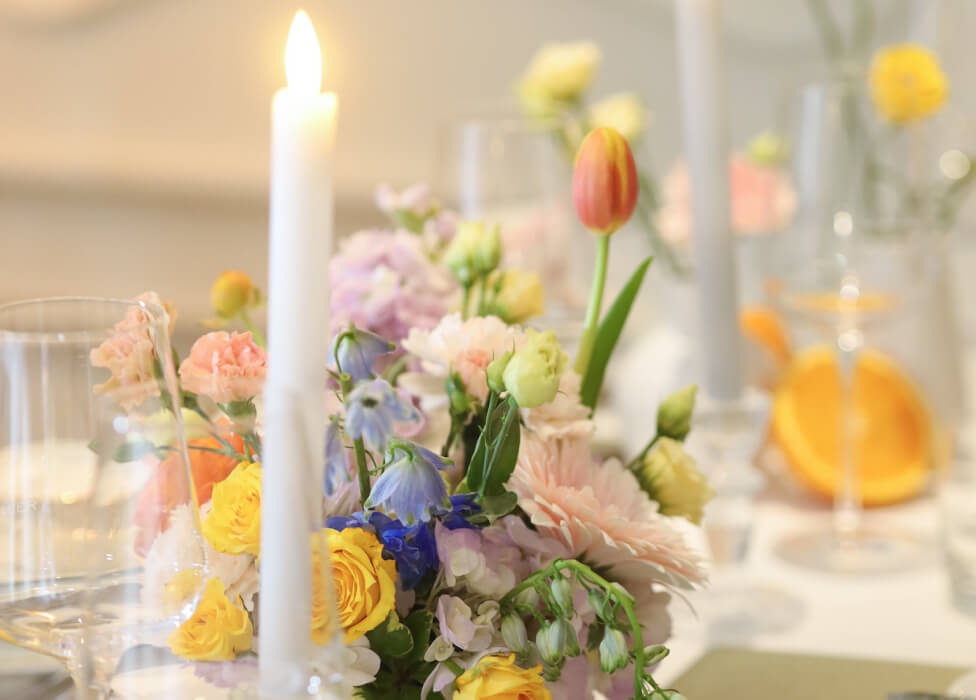 melrose flower lab table with a vase of colorful flowers